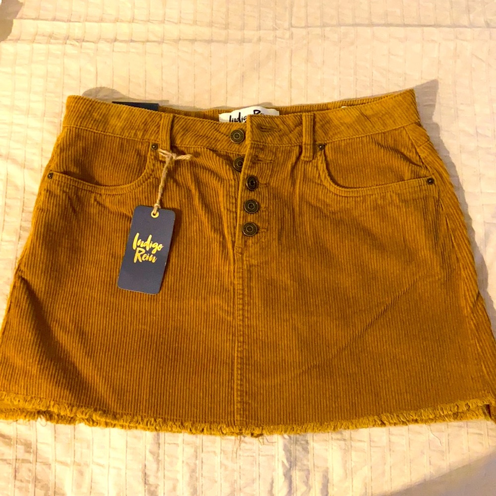 Indigo Rein, Women’s brand new, corduroy button skirt.